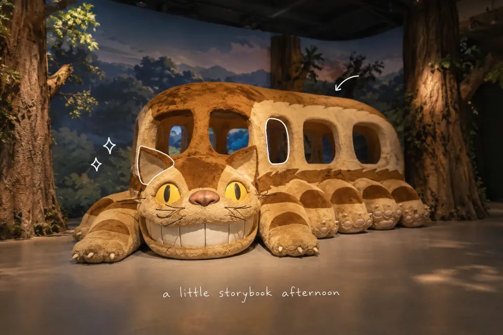 AI-generated interpretation of a furry Catbus display in an imaginary exhibition room, with a short white handwritten note.